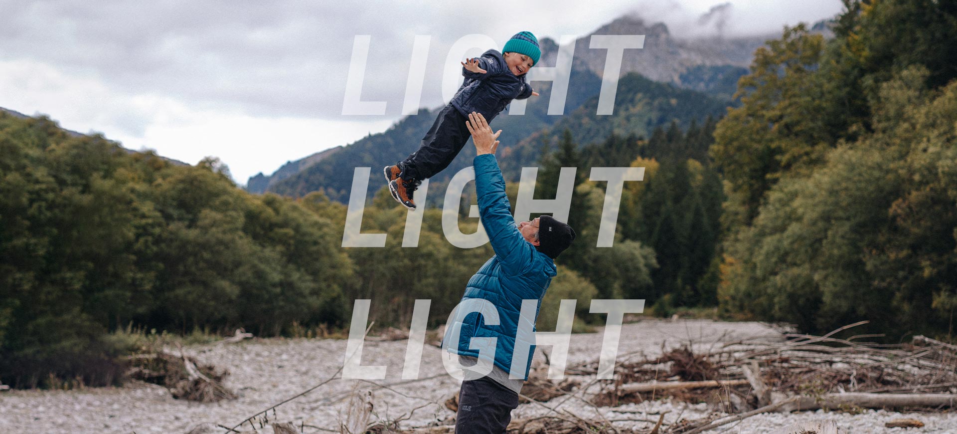 Father throws child in the air