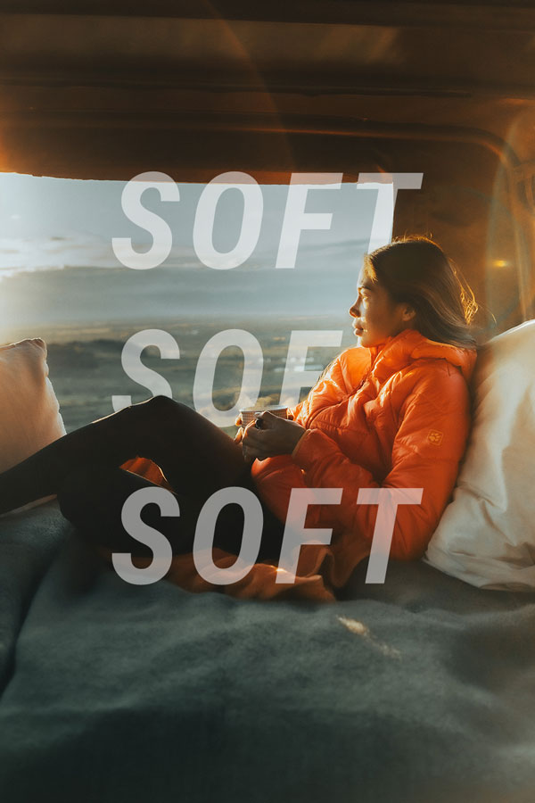 Woman in a van looking into the distance