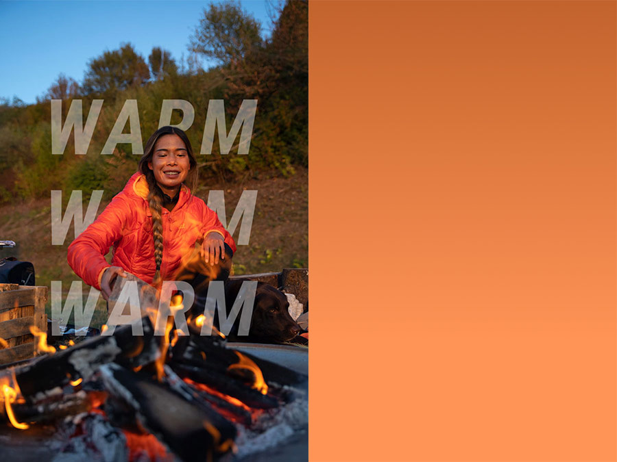 Woman at the campfire with winter jacket